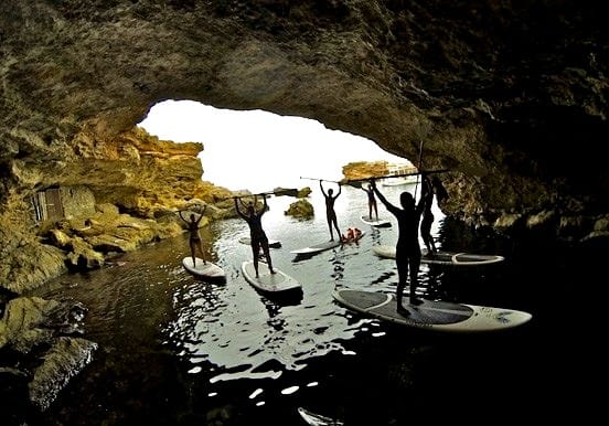Stand up paddle through coastal caves in Ibiza