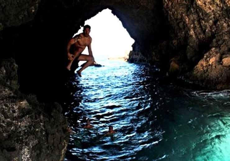 jumping off water in Gran Canaria sea cave