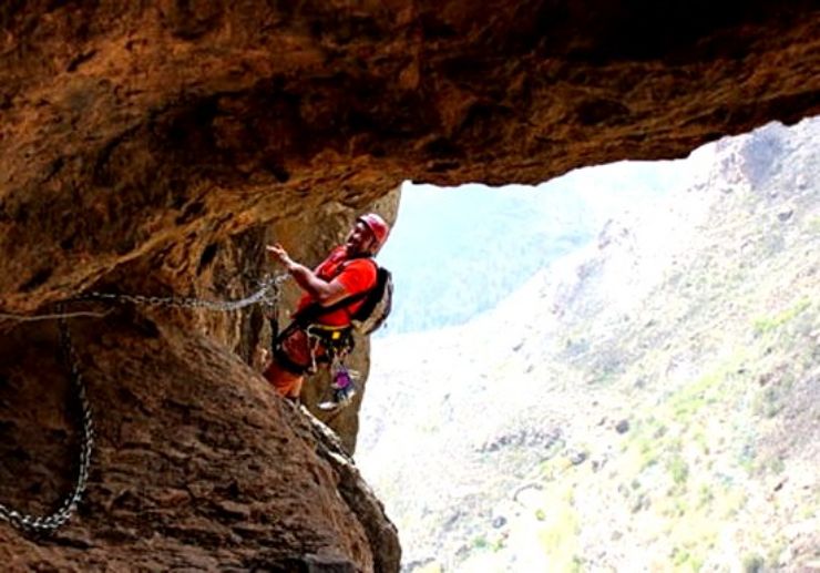 Ferrata climbing in Gran Canaria using chains and stemples