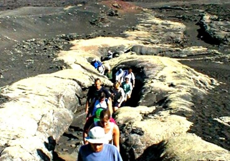 Hiking volcanic rock formation in Lanzarote