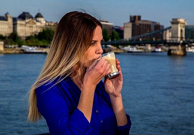 Drink coffee while cruising on Danube river in Budapest