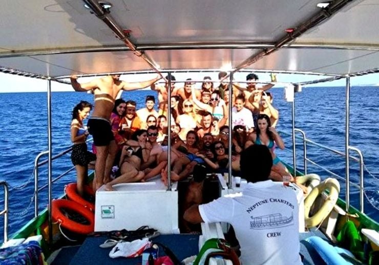 Private boat charter passengers group photo in Malta