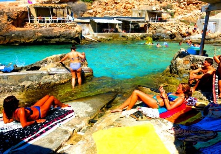 Ibiza jeep tour swimming in secluded cala